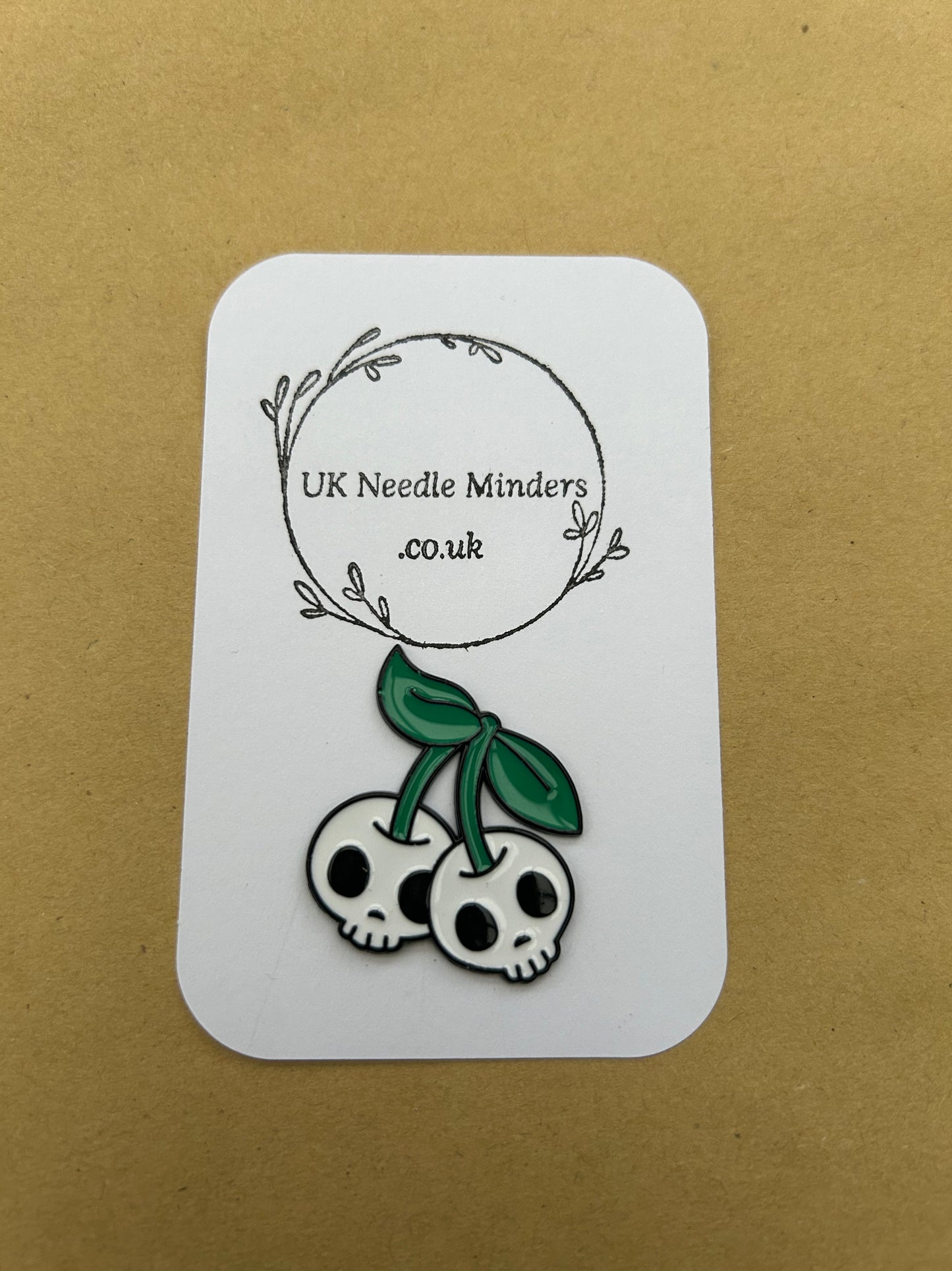 Death Skull Cherries enamel needle minder
