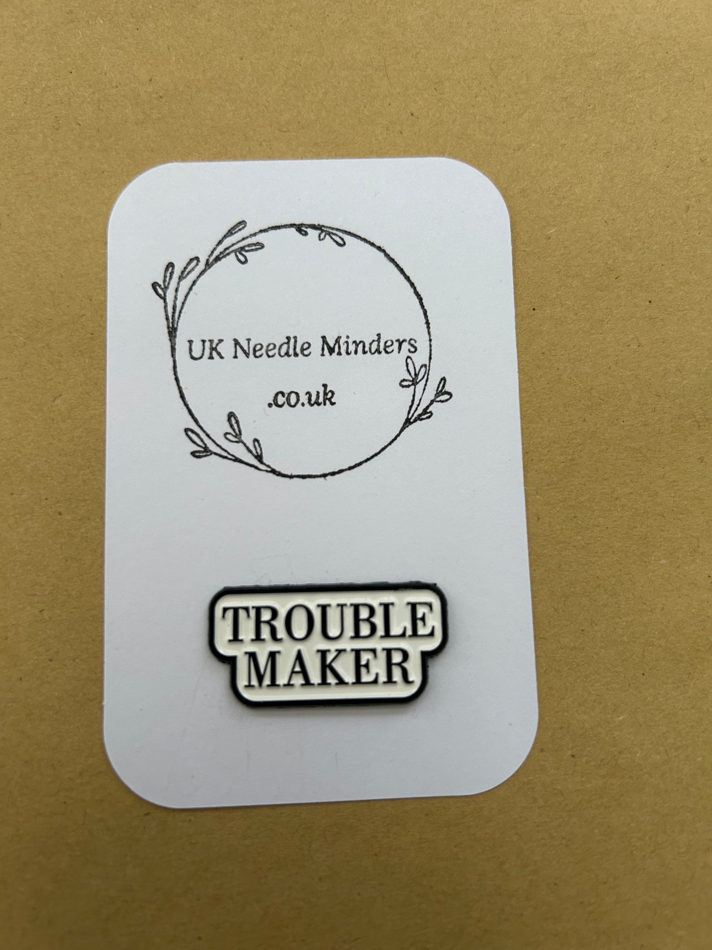 Trouble Maker enamel needle minder