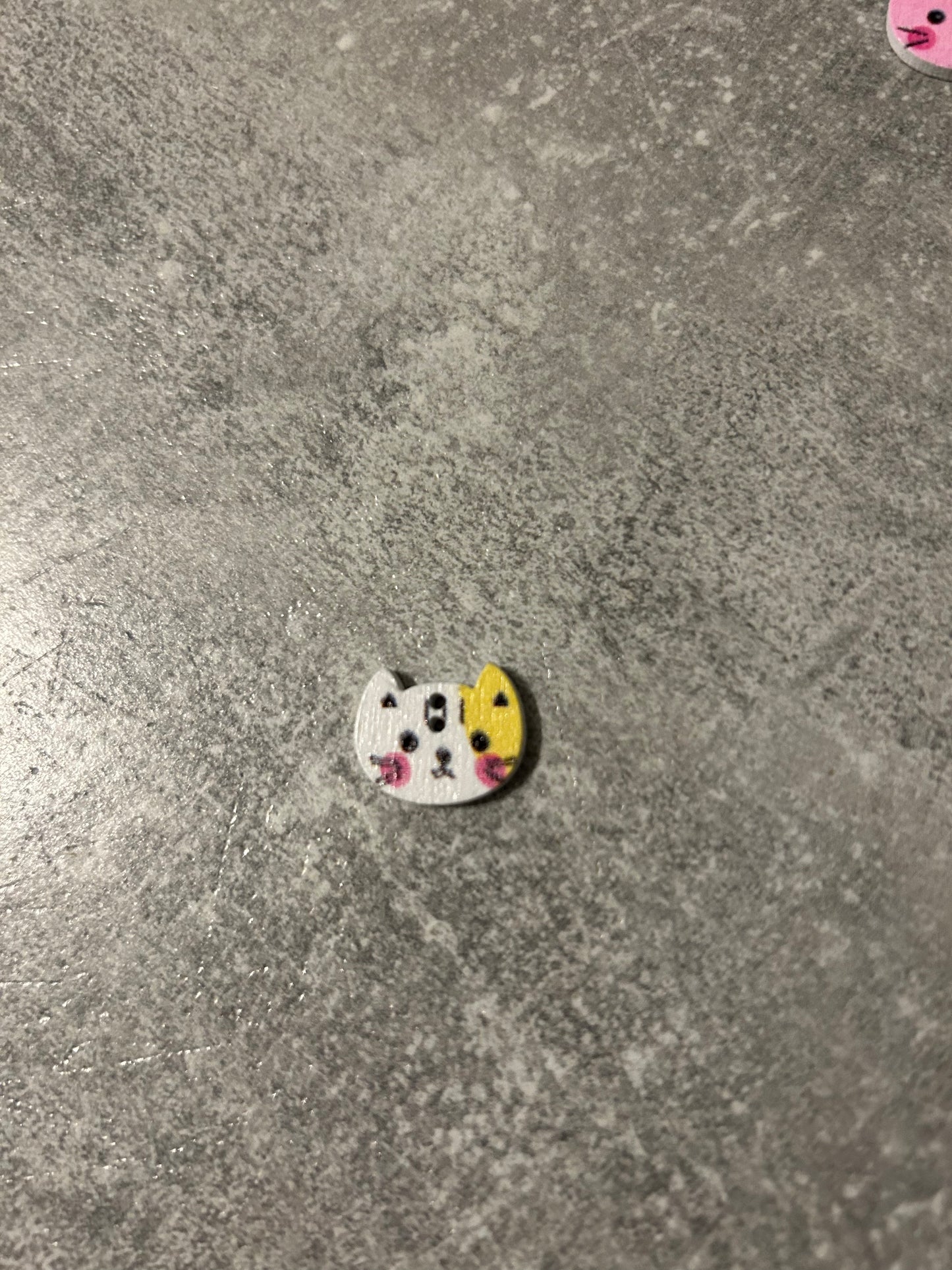 Wooden Cat needle minder