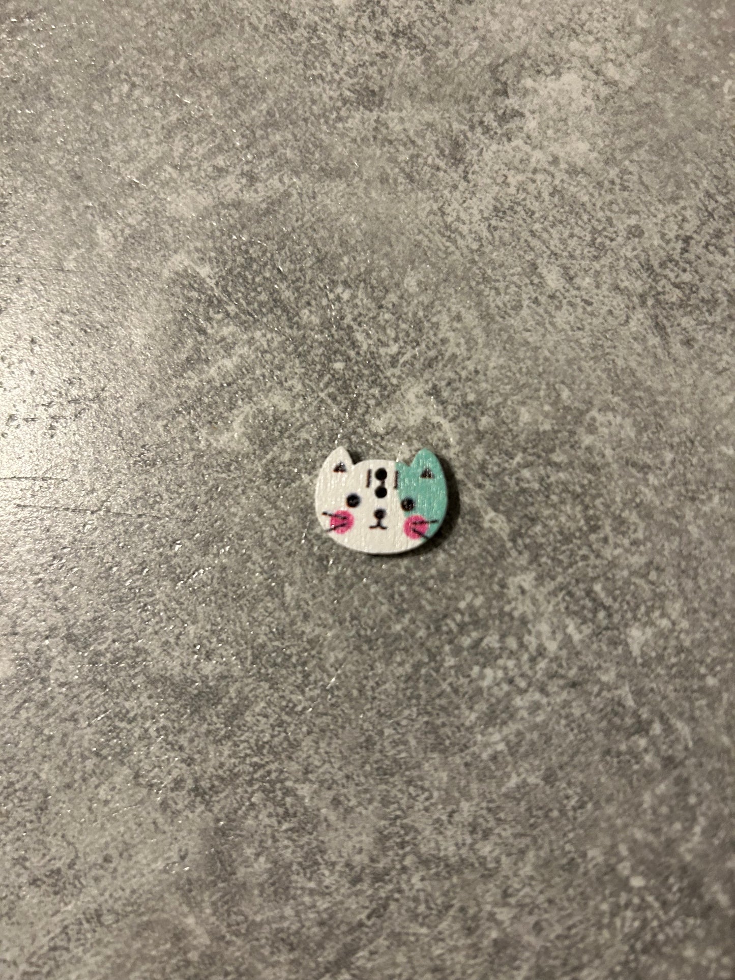 Wooden Cat needle minder