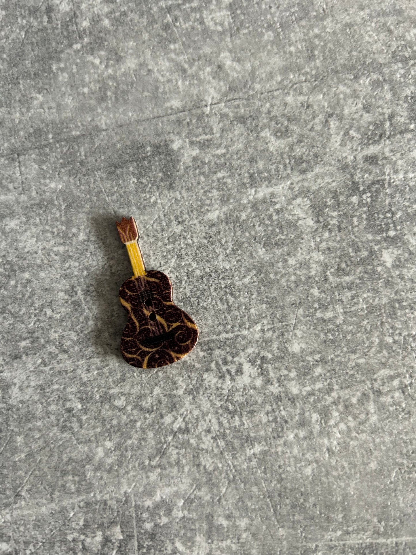 Wooden Guitar needle minder