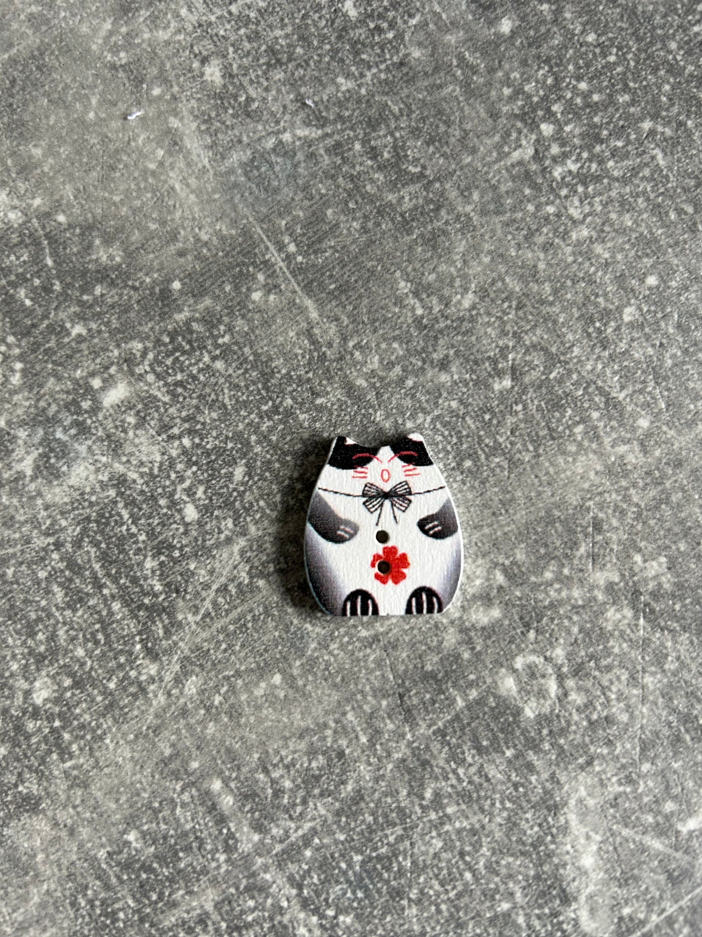 Wooden Fat Cat needle minder