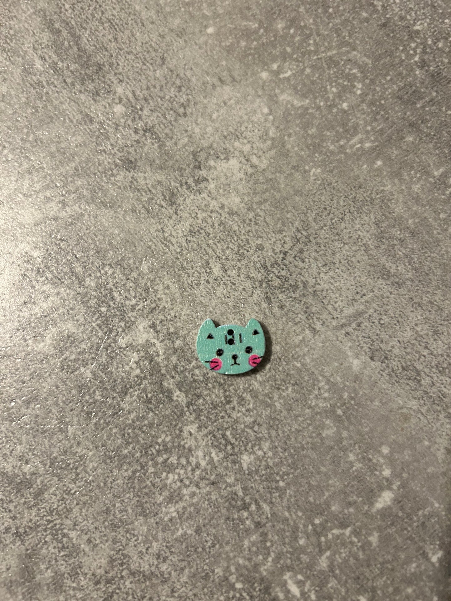 Wooden Cat needle minder