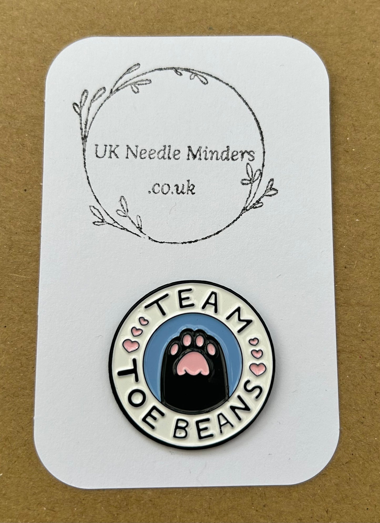 Team Toe Beans enamel needle minder