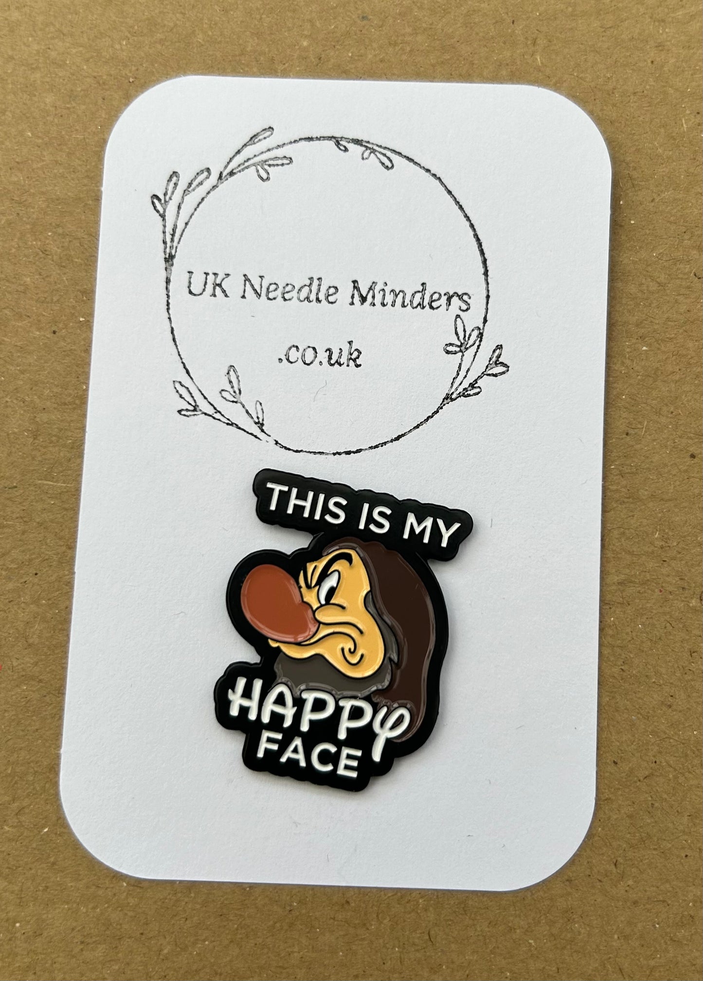 This is my Happy Face enamel needle minder