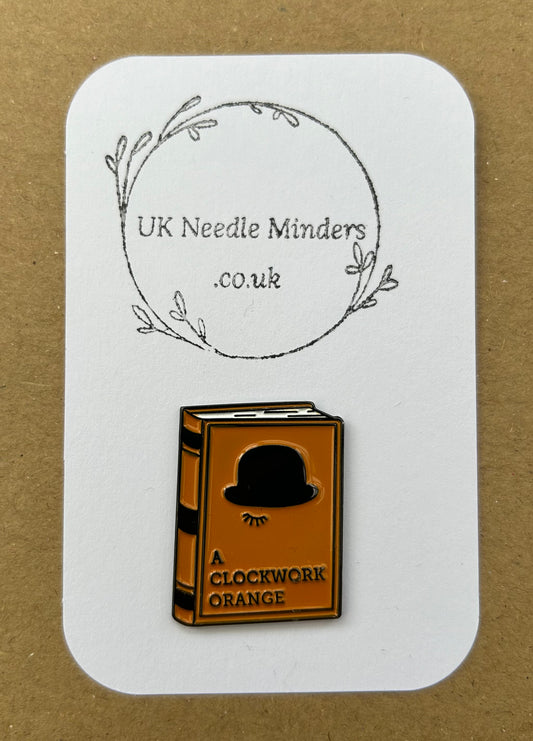 A Clockwork Orange Book enamel needle minder