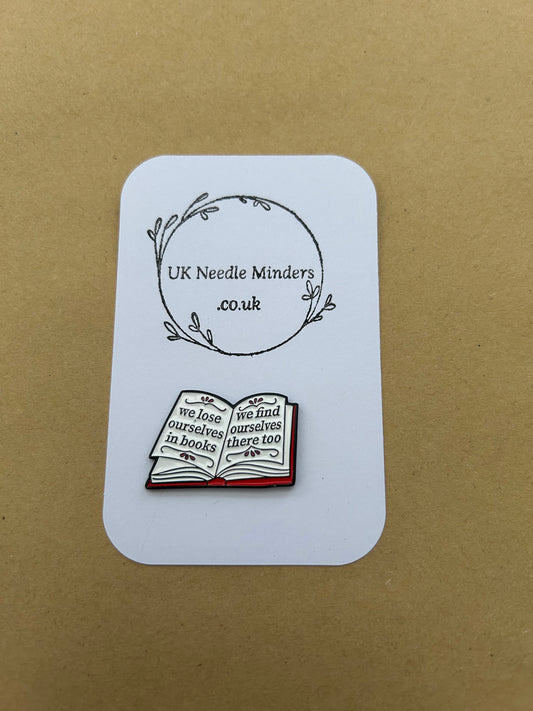 We Lose Ourselves in Books enamel needle minder