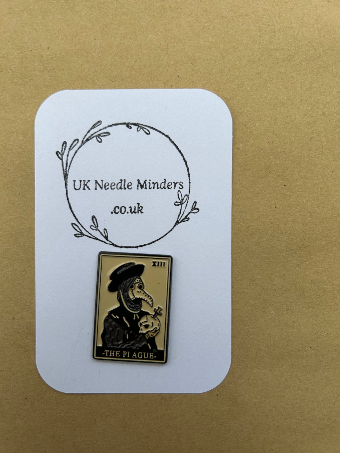 The Plague Doctor enamel needle minder