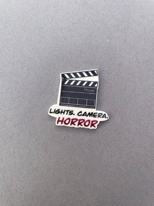 Lights, Camera, Horror needle minder