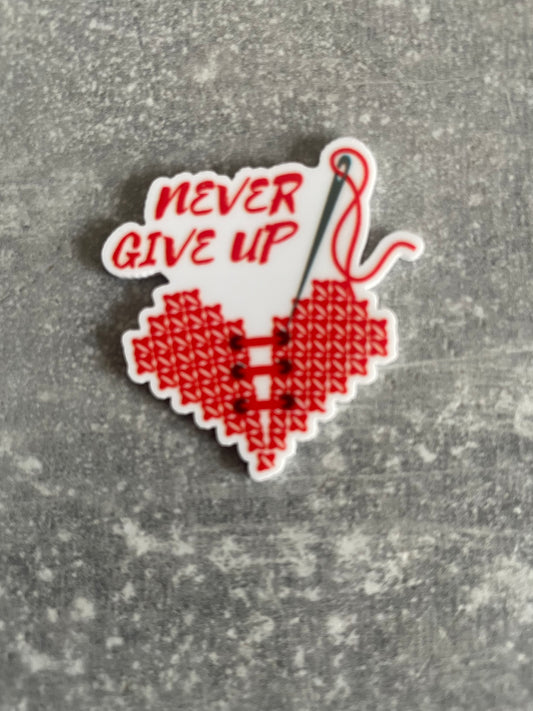 Never Give Up needle minder